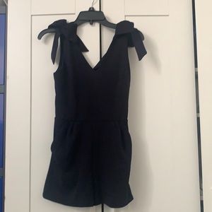 Navy jumpsuit romper with pockets bow shoulders